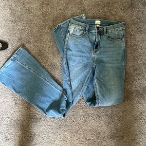 Stretchy sneak peek flared jeans